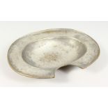 AN EARLY TINNED BRASS BARBERS BOWL. 14.25ins wide.