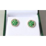 A PAIR OF 9CT GOLD, DIAMOND AND EMERALD CLUSTER EARRINGS.