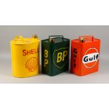 THREE REPRODUCTION OIL CANS. 12ins high.