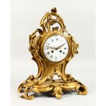 A GOOD FRENCH ROCOCO ORMOLU CLOCK, eight-day movement, striking on a bell, with circular enamel dial