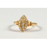 AN 18CT GOLD, DIAMOND AND MARQUISE RING.