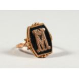 A 9CT GOLD SIGNET RING, "M".