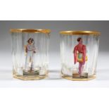 A PAIR OF AUSTRIAN CLEAR GLASS BEAKERS, each enamelled with a male figure. 3.5ins high.