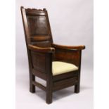 AN 18TH CENTURY OAK AND FRUITWOOD LAMBING CHAIR, the cornice engraved H.K. over two panel backs,