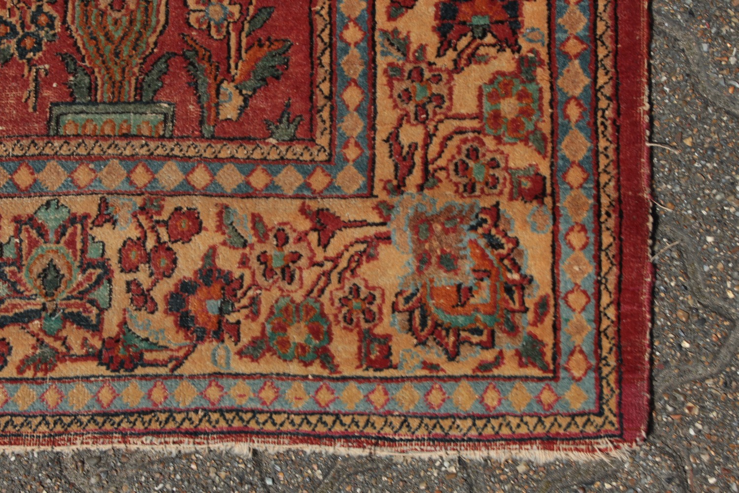 A PERSIAN KASHAN RUG with floral central motifs on a red ground with foliate border. 6ft 6ins x - Image 6 of 10