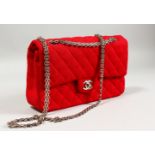 A RED CHANEL BAG with chain, in a Chanel bag.