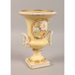 A SEVRES STYLE YELLOW GROUND PEDESTAL VASE. 10ins high.