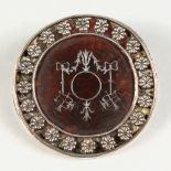 AN ASPREYS TORTOISESHELL AND SILVER CIRCULAR CLIP, No. A3433. Birmingham 191. 2.5ins diameter.