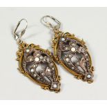 A PAIR OF GILT METAL CUT STEEL AND OPAL EARRINGS. 2ins high.