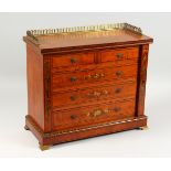 A GOOD EDWARDIAN SHERATON REVIVAL SMALL CHEST of two short and three long drawers, painted with