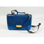 A MIU MIU BLUE LEATHER BAG, in a Miu Miu bag.