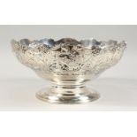 A SUPERB MAPPIN & WEBB PIERCED SILVER ROSE BOWL, pierced with fruiting vines and fruit. 11ins