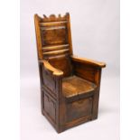 A GOOD 18TH CENTURY OAK AND FRUITWOOD LAMBING CHAIR, the back with two panels, solid seat and box