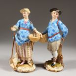 A PAIR OF 19TH CENTURY MEISSEN FIGURES OF A YOUNG MAN selling fish, and a young lady. Cross swords