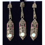 AN ART DECO DESIGN SILVER, OPAL AND RUBY PENDANT AND EARRINGS.
