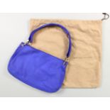 A BOTTEGA VENETA BLUE BAG, in a Bottega bag.