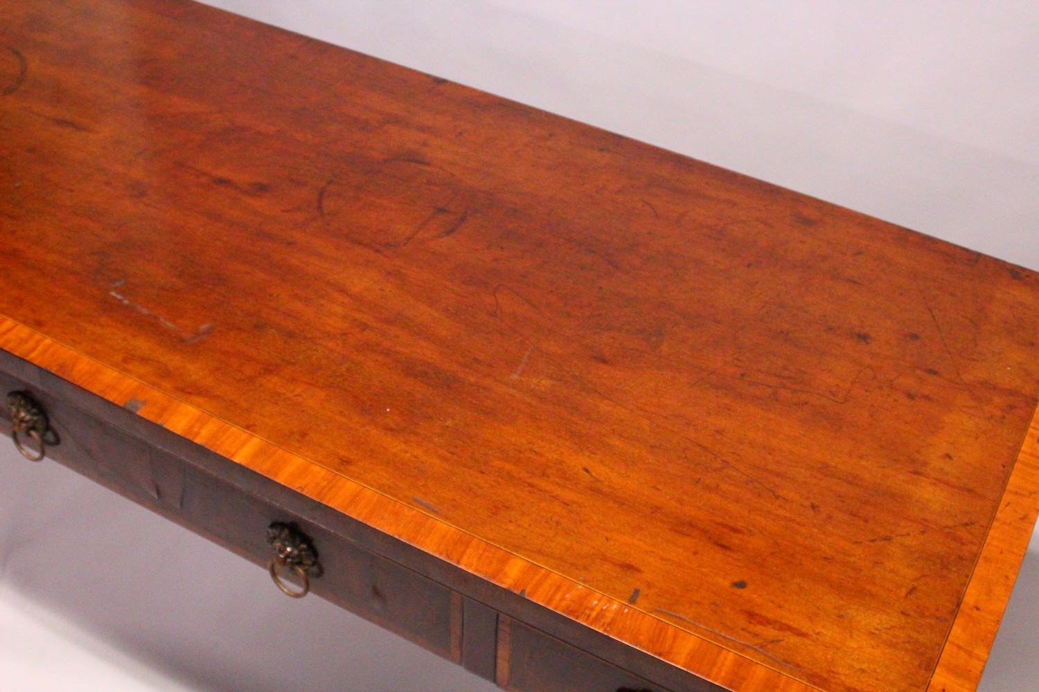 A 19TH CENTURY MAHOGANY AND SATINWOOD BANDED SERVING TABLE, with three frieze drawers having lion - Image 8 of 8