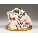 A 19TH CENTURY FRENCH PORCELAIN GROUP OF THREE LADIES, which opens to reveal an inkstand. 6.5ins