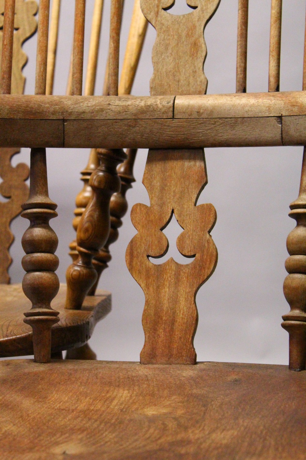 A GOOD SET OF FOUR 19TH CENTURY OAK WINDSOR HIGH BACK ARMCHAIRS. - Image 6 of 11