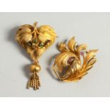 TWO VICTORIAN GOLD LEAF and FLOWER BROOCHES.