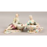 A PAIR OF MEISSEN SWEETMEAT DISHES, with a gallant and lady laying beside a basket. Cross swords