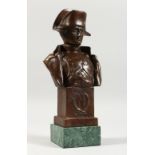 A BRONZE BUST OF NAPOLEON, on a marble base. 11.5ins high.