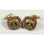 A GOOD PAIR OF RUSSIAN SILVER GILT, ENAMEL AND DIAMOND CUFFLINKS, mounted with elephants and a