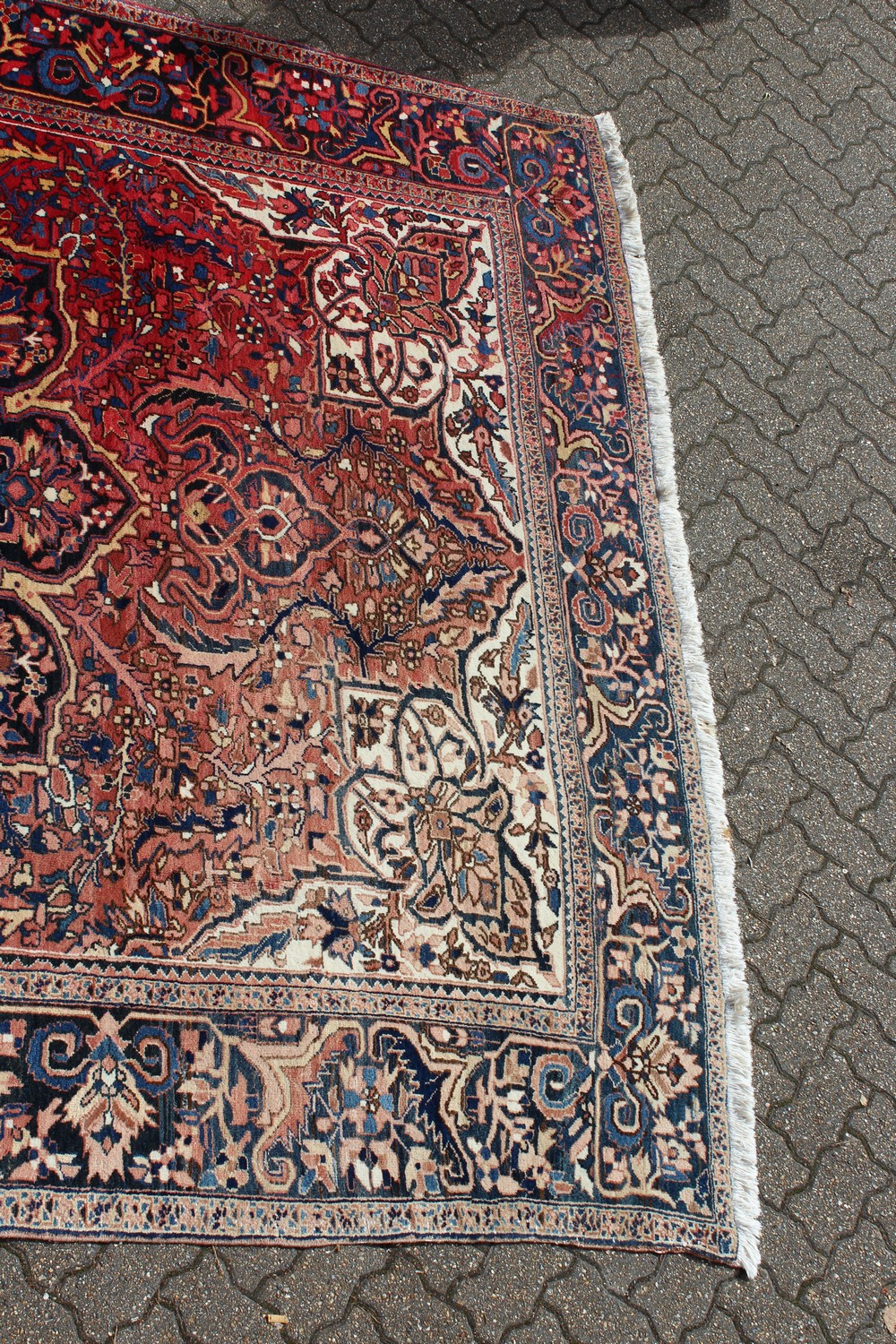 A PERSIAN STYLE HERIZ CARPET, 20TH CENTURY, red ground with allover stylised floral decoration (some - Image 2 of 9