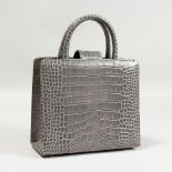 A GAIA GREY SNAKESKIN BAG, in a Gaia bag.