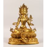 A GILT BRONZE FIGURE OF THE GOD TARA. 12ins high.