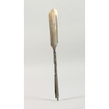 AN UNUSUAL RUSSIAN SILVER LETTER OPENER, modelled as a pair of oars, boxed. 9.5ins long.