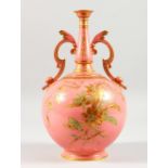 A GOOD CROWN DERBY PINK GROUND TWO-HANDLED BULBOUS VASE, for the Islamic market, with gilt