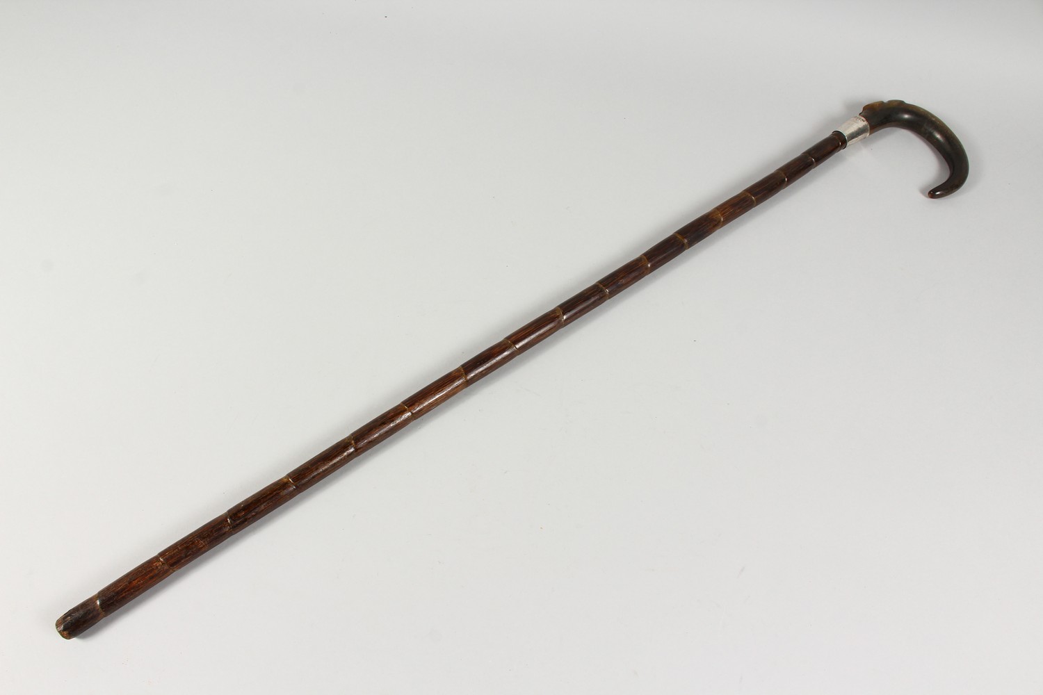 A WALKING STICK with rhino handle and silver band stamped silver. 2ft 9ins long. - Image 9 of 9