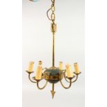 AN EMPIRE STYLE BRASS SIX-BRANCH CHANDELIER. 20ins high.