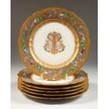 A SET OF SIX SEVRES PLATES, with gold and coloured decoration. 10ins diameter.