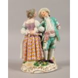 A GOOD MEISSEN GROUP OF A YOUNG MAN AND GIRL DANCING. Cross swords mark in blue. 5.5ins high.