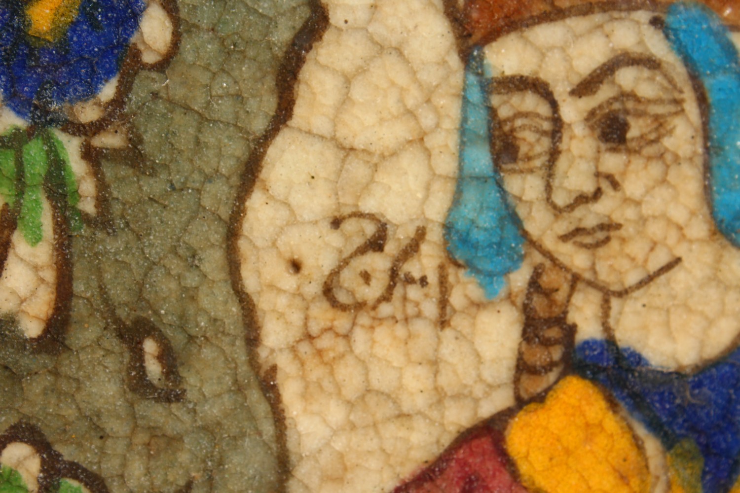 AN ISLAMIC POTTERY TILE, painted with a bust within a floral border, mounted in a later carved - Image 3 of 8