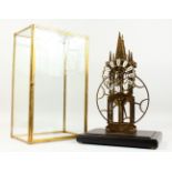 A GOOD MODERN, LARGE SKELETON CLOCK, in a glass case. 1ft 9ins high overall.