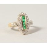 A 9CT GOLD DECO DESIGN EMERALD AND DIAMOND RING.