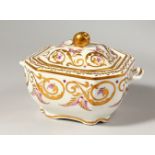 AN OCTAGONAL SPODE SUGAR BOX AND COVER, decorated with a gilt and lavender design, Spode Feldspar