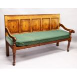 AN 18TH CENTURY OAK PANEL BACK SETTLE, with five mahogany banded panels, loose cushion, on turned