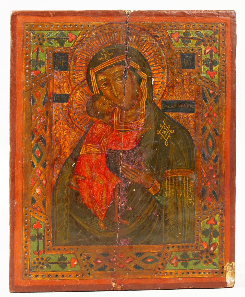 A 17TH CENTURY ICON, Madonna and Child, on panel. 9ins x 7ins.