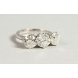 A VERY GOOD 18CT WHITE GOLD THREE-STONE DIAMOND RING of 3.22CTS.