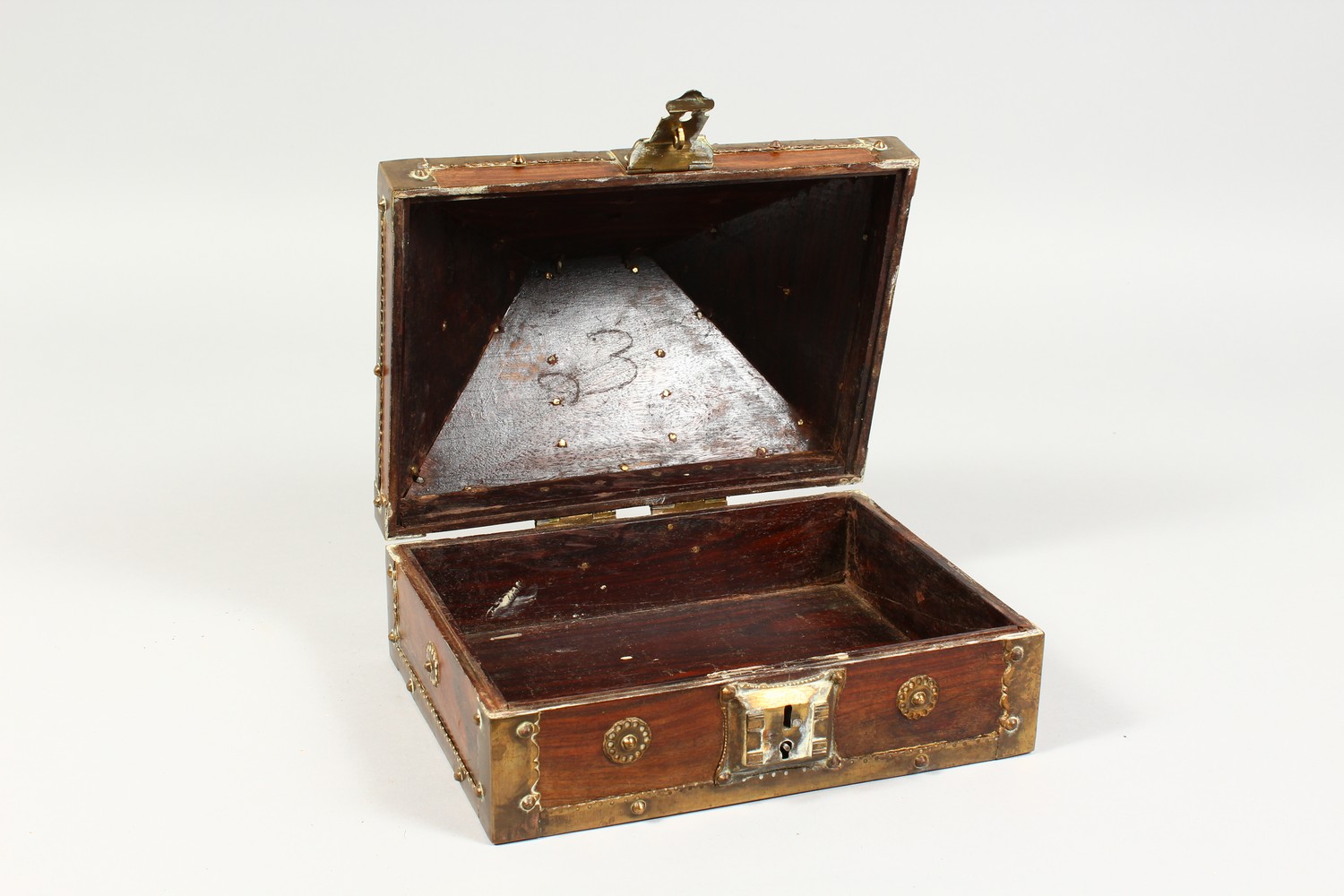 AN EASTERN BRASS BOUND WOODEN CASKET. 9ins wide. - Image 2 of 2