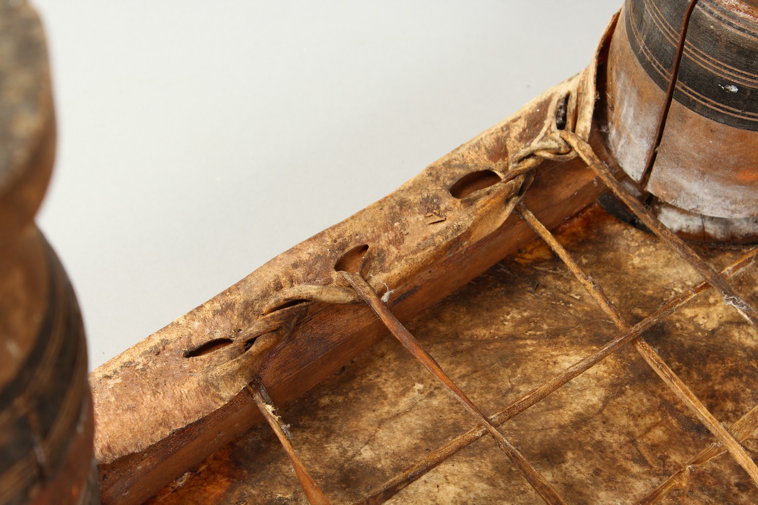 A NORTH AFRICAN PAINTED WOOD AND ANIMAL SKIN SQUARE SHAPED STOOL. 15ins wide x 11.5ins high. - Image 8 of 8