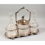 AN UNUSUAL COMBINATION BISCUIT BARREL AND DOUBLE DECANTER STAND, with cut glass biscuit barrel and