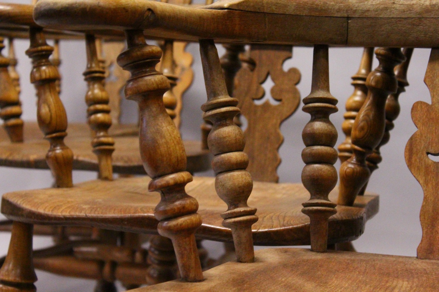 A GOOD SET OF FOUR 19TH CENTURY OAK WINDSOR HIGH BACK ARMCHAIRS. - Image 7 of 11