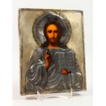 A RUSSIAN ICON, with silver overlay. Maker: C.R. 8.5ins x 6.5ins.
