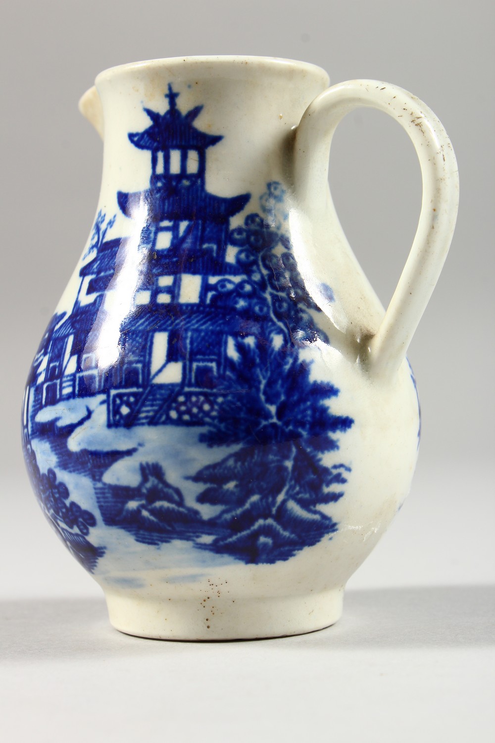 A WILLOW PATTERN DESIGN SPARROW BEAK JUG. 3.5ins high. - Image 3 of 11