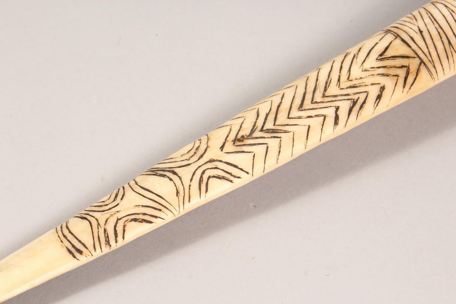 A CARVED BONE DAGGER, with incised decoration. 15.75ins long. - Image 8 of 9